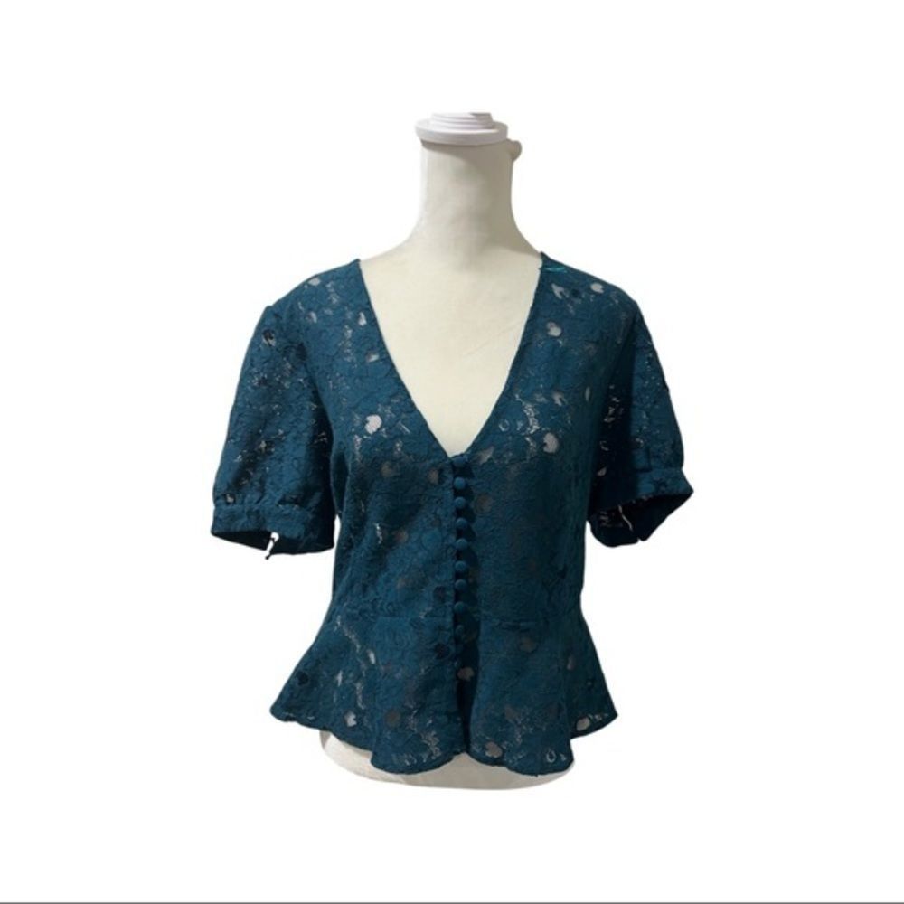 Free people teal lace peplum blouse Elastic Waist in the back. Size Large